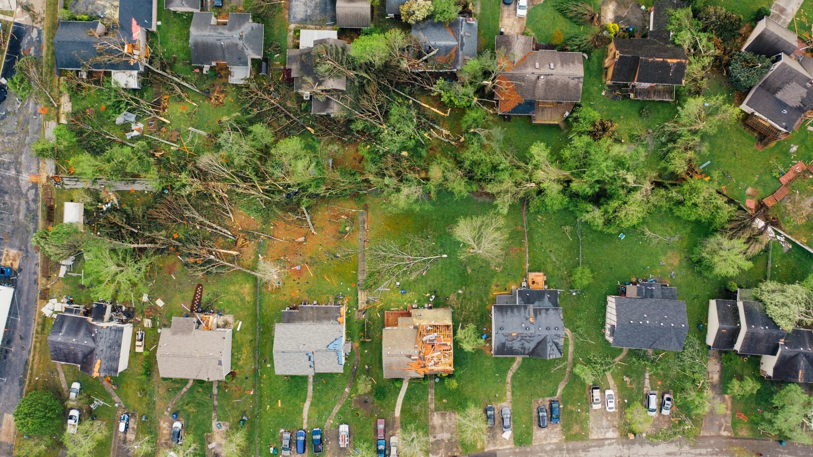 Aerial view of storm-damaged roofing, the kind of wide-angle documentation Kent County insurers expect with a claim